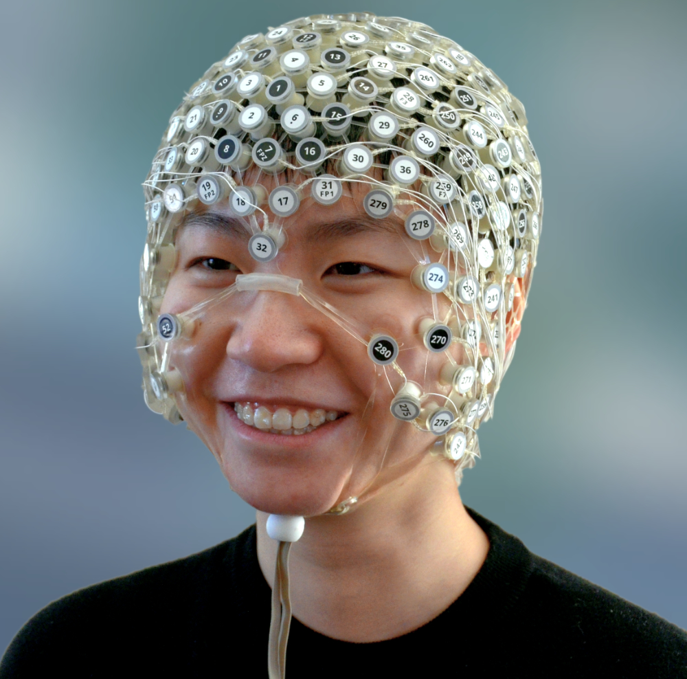 Photo of asian woman wearing a Geodesic Head Web.